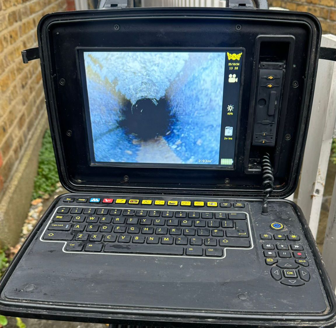 CCTV drain survey being carried out after an emergency drainage callout to investigate the cause of a blocked drain in Twickenham